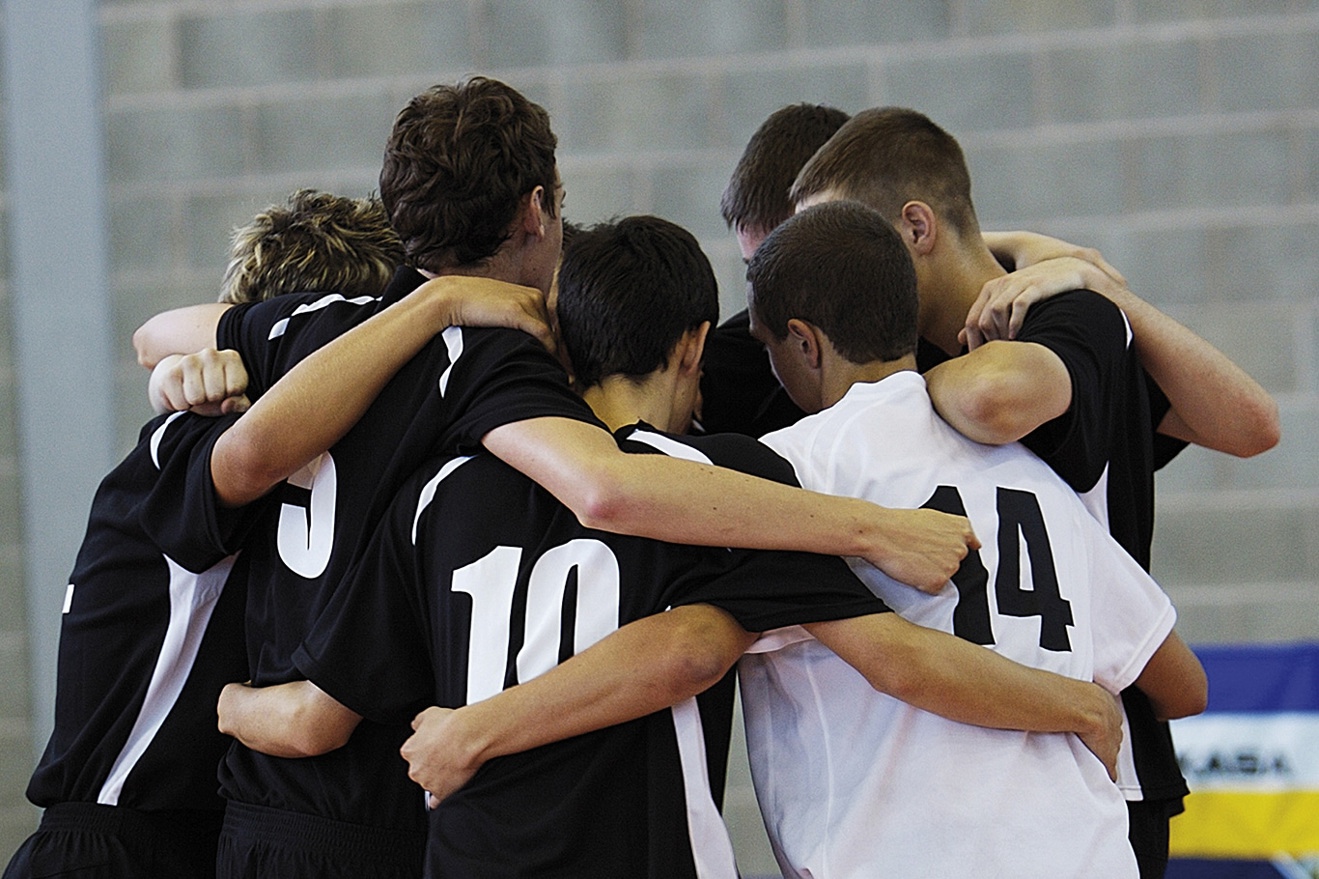 Group of young boys playing sport