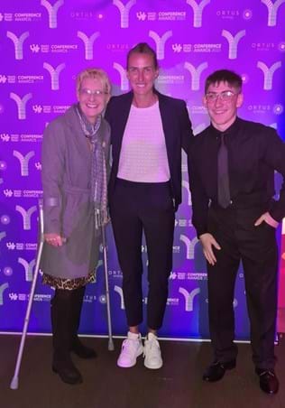 Asten pictured with Jill Scott MBE at YST Awards dinner and his teacher