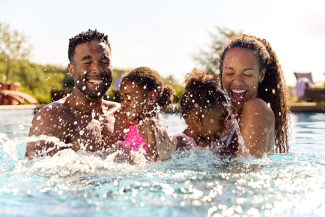 A family have fun swimming